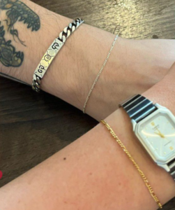 image shows two wrists showing off their silver and gold welded bracelets by b51 boutique